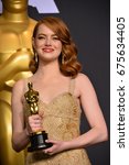 Small photo of LOS ANGELES, CA - FEBRUARY 26, 2017: Emma Stone in the photo room at the 89th Annual Academy Awards at Dolby Theatre, Los Angeles