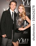 Small photo of Stephen Lunsford and Aimee Teegarden at the 5th Annual YMI Jeans Fashion Show and After Party. Music Box Theatre, Hollywood, CA. 10-06-08