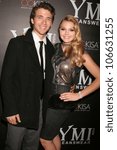 Small photo of Stephen Lunsford and Aimee Teegarden at the 5th Annual YMI Jeans Fashion Show and After Party. Music Box Theatre, Hollywood, CA. 10-06-08