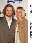 Small photo of Elden Henson and Ashley Scott at the Gridlock New Years Eve 2007 Party, Paramount Studios, Los Angeles, CA 12-31-06