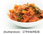 Korea Kimchi, close up homemade kimchi in white bowl on white background. Healthy food of Asia.