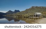 Small photo of the old boat shed at dove lake with cradle mt in the distance on a calm summer morning at cradle mountain national park of tasmania, australia