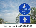 Hurricane Evacuation Route Road Sign on blue with arrow