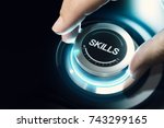 Hand turning a skill test knob to the maximum position. Concept of professional or educational knowledge over black background. Composite image between a hand photography and a 3D background.