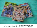 Small photo of One piece and Jojo steel run ball manga asian comic books, Vitoria, Spain, 10 of April 2023