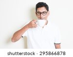 Indian Guy Holding A Cup ...