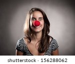 Happy Young Girl With A Clown...