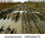 Dirty Broken Rural Road With...