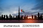 Small photo of United Arab Emirates flag and Dubai skyline view at sunset. UAE celebration. National day, Flag day, Commemoration day, Martyrs day.