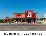 Small photo of exterior building of fast food restaurant KFC (Kentucky Fried Chicken) KFC drive through restaurant Bangkok, Thailand-Decenber 13, 2021