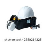 Small photo of Construction worker tools and safety equipment: toolbox, hard hat, ear muffs and goggles