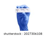Scientist hand showing rapid test kit for viral disease COVID-19 2019-nCoV with positive result. Lab card kit test for viral sars-cov-2 virus. Rapid test device coronavirus