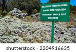 Small photo of West Java, Indonesia - 3 Dec 2013: Information board on Edelweiss conservation field in Alun-alun Suryakencana of Gede Pangrango National Park mentioning the name of mountain and flora