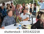 Small photo of Book Fair Reception East Hampton, NY USA August 12 2017 Dick Cavett being interviewed at Authoris Night