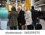 Small photo of Dusseldorf Airport, Dusseldorf, Germany.March 21,2013. A passengers attempts to check in for a flight at Lufthansa. The strike is due to because Lufthansa has said, it wants to freeze wages.
