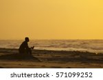 Silhouette Of A Man On A Beach