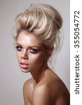 Small photo of portrait of beautiful young blonde girls, with glowing skin, beautiful makeup and very puffy kissable lips, with professional retouching