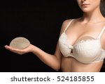 Silicone implants on hand and natural brest

