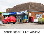 Small photo of 7 September 2018 A Royal mail van parked in front of small shop units in Bangor County Down Northern Ireland. These small business provide a valuable service for local residents.