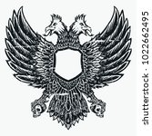 double headed eagle bird hand... | Shutterstock .eps vector #1022662495