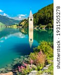 Small photo of Submerged Bell Tower of Curon at Graun im Vinschgau on Lake Reschen in South Tyrol, Italy