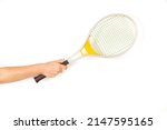 Woman hand holding a vintage aluminum racket on a white background with copy space