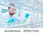 Laboratory scientist working at lab with test tubes