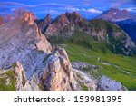 Mountain landscape with summits and valley after sunset, Dolomite Alps, Italy