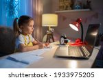 schoolgirl girl studies online... | Shutterstock . vector #1933975205