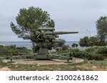 Antique anti-aircraft artillery on display in the gardens of the military museum of the castle of San Carlos, Palma de Mallorca, Spain