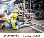 Small photo of Female workers are banning cargo drivers from continuing to drive due to an accident, a male worker's leg gets stuck in a forklift's wheel while working inside an auto-parts warehouse.