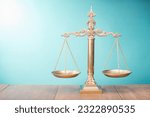 Retro law scales on table. Symbol of justice. Vintage old style filtered photo
