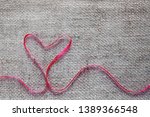 red heart ribbon isolated on... | Shutterstock . vector #1389366548