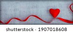 red heart and ribbon isolated ... | Shutterstock . vector #1907018608