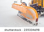 Snow Plow Doing Snow Removal...