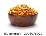 Close up of corn flex mixture Indian namkeen (snacks) In hand-made (handcrafted) wooden bowl