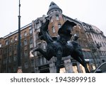 Small photo of Saint-Petersburg, Russia, 31 August 2020: Pegasus sculpture on Bolshaya Konyushennaya street. Sculptor Vasily Azemshey. On the background is N. A. Meltzer apartment house.