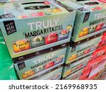 Small photo of San Jose, CA - June 15, 2022: Cases of Truly Margarita Style Mix Pack of canned hard seltzer.