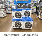 Small photo of Los Angeles, CA - August 1, 2023: Lasko box fans on display inside Walmart store. Center of idle setup.