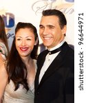 Small photo of BEVERLY HILLS, CA - FEB. 26: Designer Alexandra Tonelli & actor Adrian Paul arrive for the 22nd Annual Night Of 100 Stars event held at The Beverly Hills Hotel on Feb. 26, 2012 in Beverly Hills, CA.