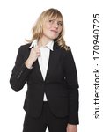 Small photo of Uncomfortable businesswoman pulling at her collar either in discomfit at the fit of her shirt or because she is nervous, isolated on white