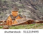 Surb Karapet St. John the Baptist Church in Armenia. Noravank monastery is a popular historical site in Armenia. Mountains at the background