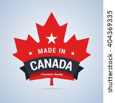 made in canada badge. colorful... | Shutterstock .eps vector #404369335
