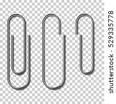 Metal Paper Clips Isolated And...