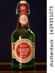 Small photo of TWINSBURG, OH, USA - JANUARY 23, 2020: Trader Joe’s Triple Ginger Brew, a holiday ginger ale with a stopper top, against a dark background.