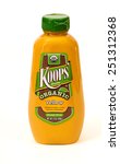 Small photo of TWINSBURG, OH, USA - FEBRUARY 7, 2015: A bottle of Koop's Organic Yellow Mustard on white.