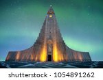 Hallgrímskirkja is a Lutheran (Church of Iceland) church in Reykjavík.It is the largest church in Iceland and the tallest structures in Iceland.There is an colorful aurora borealis in baackground