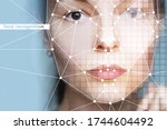 Small photo of using intelligent technologies and neural network algorithms. Female face and grid on nodal points, technologies and algorithms of identification of person on photos and videos of different quality