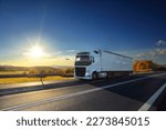 Truck transport on the road at...