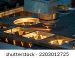 Small photo of The fiber laser cutting machine cutting machine cut the metal plate. The hi-technology sheet metal manufacturing process by laser cutting machine.